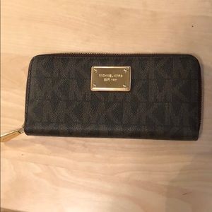 Authentic Michael Kors zip around wallet